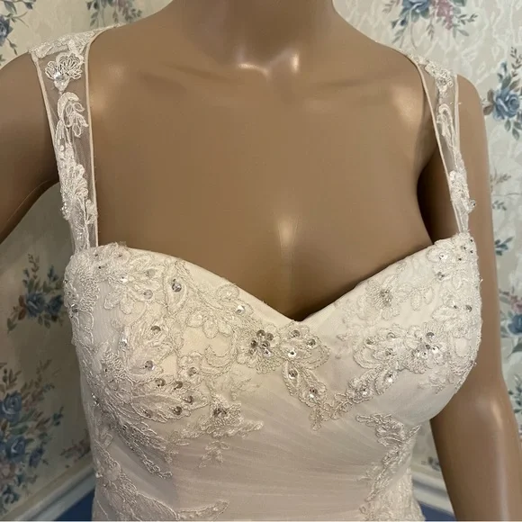 DAVID'S BRIDAL COLLECTION ivory tulle trumpet w/illusion back